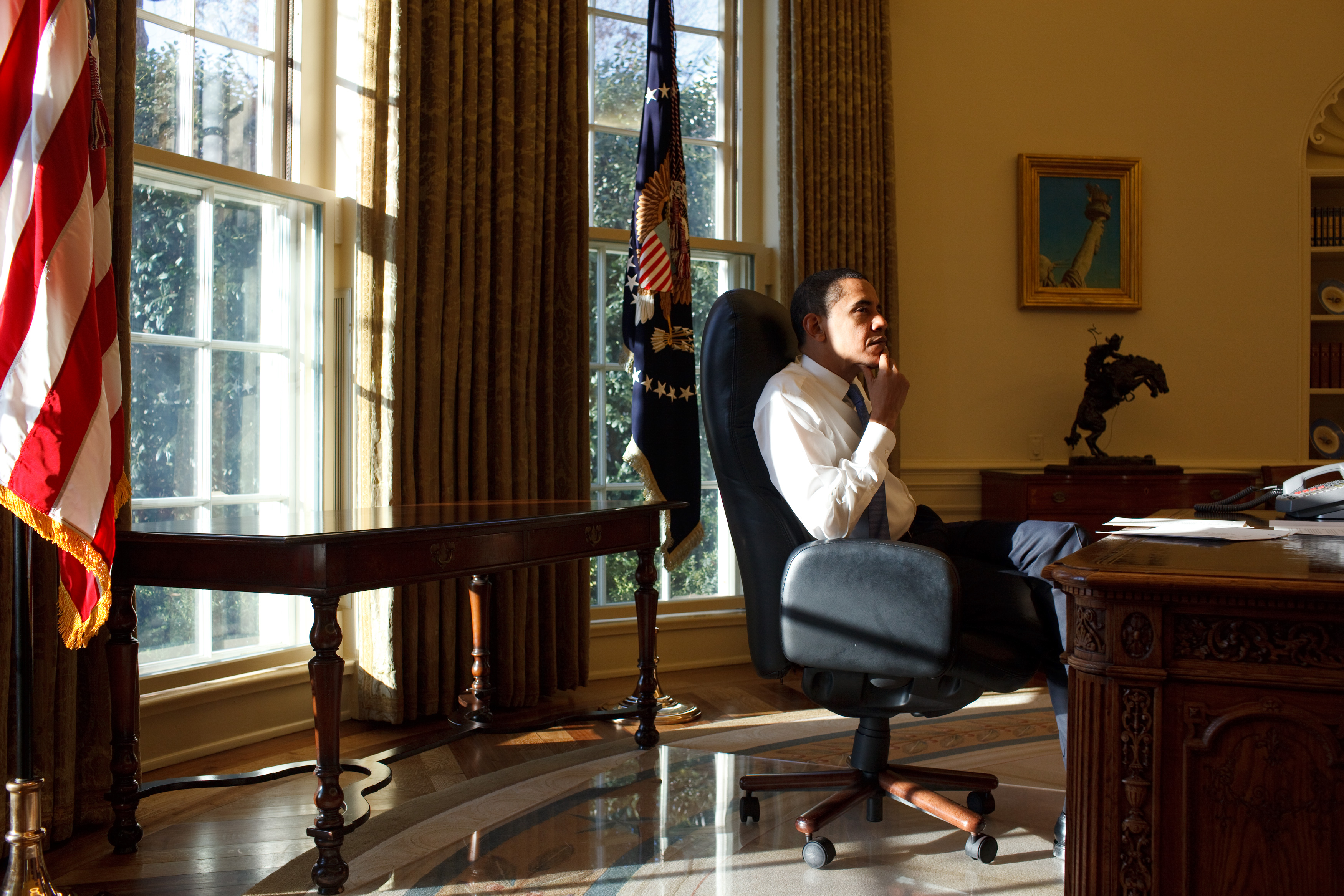 President Barack Obama in the Oval Office on his first day in office 1/21/09.
